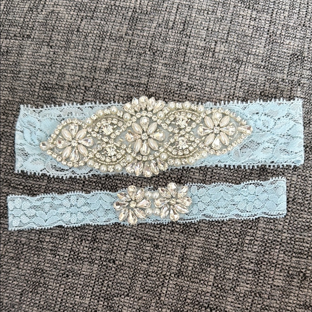 Elegant Blue Lace Garter sat with Crystal Embellishments